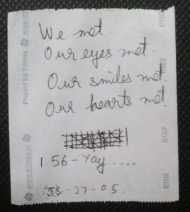 A story written on the back of a ticket on Bus. 56. We met. Our Eyes Met. Our Smiles Met. Our Hearts Met. 56 - Yay .... JS - 27 - 05